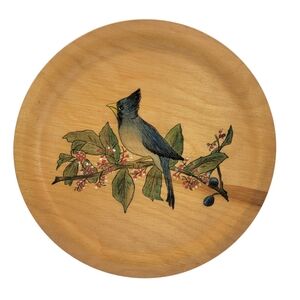 round wooden handpainted plate with a Steller's Jay bird